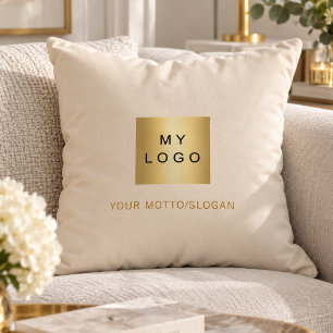 Cream gold slogan business logo cushion