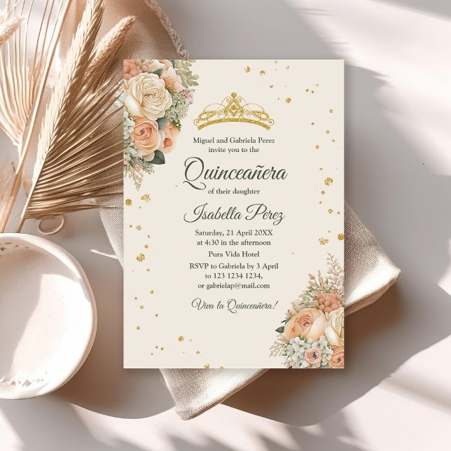 Cream Peach Floral and Gold Tiara Quinceanera  Invitation (Cream Peach Floral and Gold Tiara Quinceanera Invitation on a table with neutral decoration.)