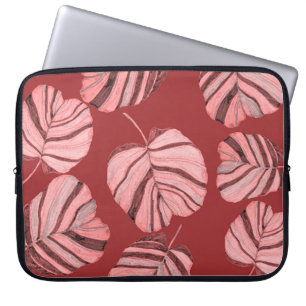 Creative seamless pattern with tropical leaves and laptop sleeve