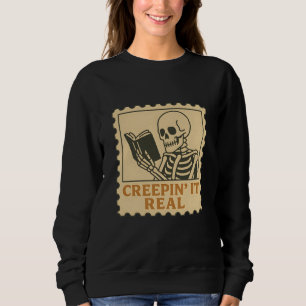 Creepin’ It Real – Skeleton Book Lover Halloween Sweatshirt