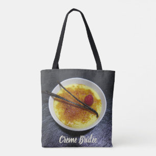 Creme brulee on slate with raspberry and vanilla tote bag