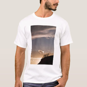 Crepuscular rays radiate across the sky at T-Shirt
