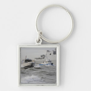 Crews from the coast guard and police departmen key ring