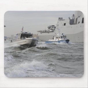 Crews from the coast guard and police departmen mouse mat