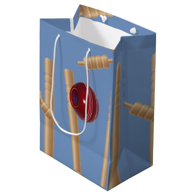 Cricket Ball On Blue Smashing Cricket Stumps, Medium Gift Bag (Front Angled)