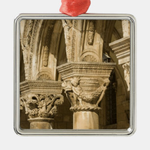 Croatia, Dalmatia, Dubrovnik. Stone arches and Metal Tree Decoration