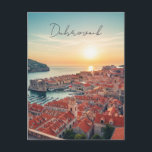 Croatia Dubrovnik Travel Postcard<br><div class="desc">Perched like a terracotta crown upon the sparkling Adriatic, Dubrovnik’s ancient walls encircle a jewel-bright city where limestone streets gleam under the Mediterranean sun. Walking the ramparts, you survey a panorama of ochre roofs tumbling towards crystal waters, punctuated by the imposing silhouette of Lovrijenac Fortress rising from its rocky islet....</div>