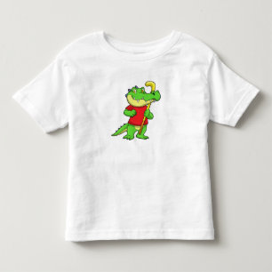 Crocodile at Field hockey with Stick Toddler T-Shirt