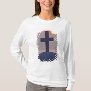Cross on top of church at sunset, Mykonos,