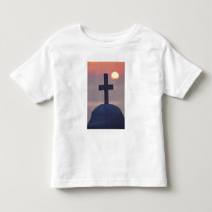 Cross on top of church at sunset, Mykonos,