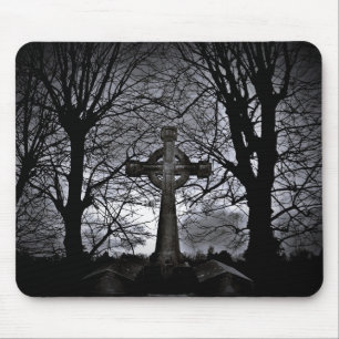 Cross surrounded by trees mouse mat