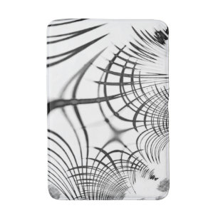 Crossed grey lines remind us of drawings of claw bath mat