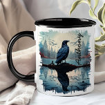 Crow by Tranquil Lake Reflection Mug<br><div class="desc">Sip your favourite beverage with the Crow by Tranquil Lake Reflection Mug. This captivating mug features a striking design of a crow perched on a rock by a serene lake, with the peaceful forest and sky beautifully reflected in the water. Customised with your name, it adds a unique and personal...</div>