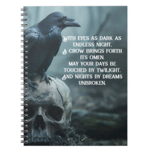 Crow sitting on a skull with a gothic message notebook