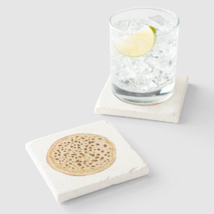 Crumpet on white stone coaster