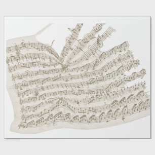 Crumpled vintage handwritten melody on taupe wrapping paper