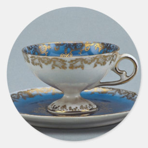 Cup and saucer with colourful designs classic round sticker