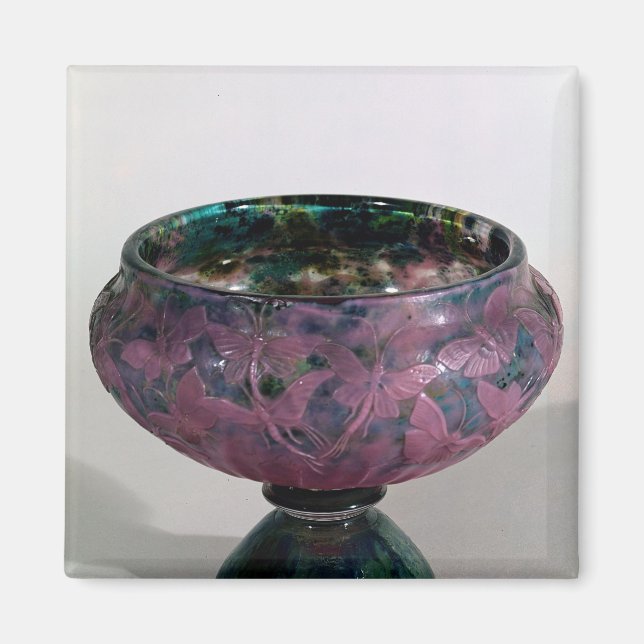 Cup decorated with butterflies and winged magnet (Front)