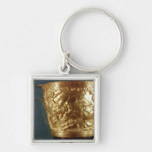 Cup, depicting a charging bull key ring