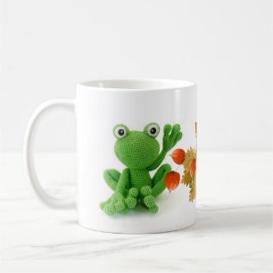 Cup of a very green frog of crochet
