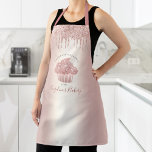 Cupcake Bakery Rose Gold Girly Glitter Drip Script Apron<br><div class="desc">Here’s a wonderful way to add to the fun of baking. Add extra sparkle to your culinary adventures whenever you wear this elegant, sophisticated, simple, and modern apron. A sparkly, rose gold cupcake, script handwritten typography and glitter drips overlay a girly faux metallic rose gold ombre background. Personalise with your...</div>