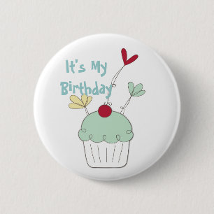 Cupcake birthday badge with cherry and flowers