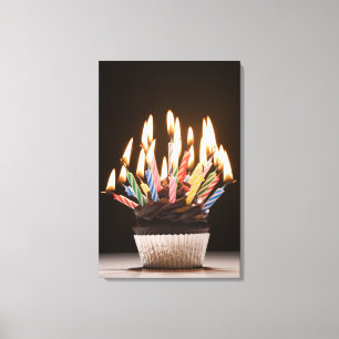 Cupcake with birthday candles canvas print