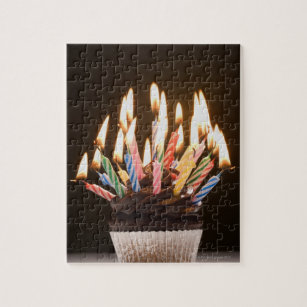 Cupcake with birthday candles jigsaw puzzle