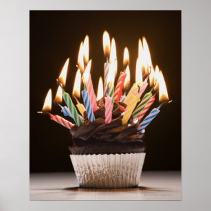 Cupcake with birthday candles poster