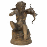 Cupid 2 Magnet Photo Sculpture Magnet<br><div class="desc">Acrylic photo sculpture magnet with an image of a gold figurine of cupid aiming his bow and arrow. In classical mythology, Cupid is the Roman god of desire, love, attraction and affection. He is often portrayed as the son of the love goddess Venus and the war god Mars. He is...</div>