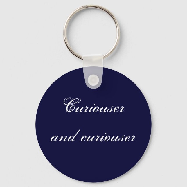 Curiouser and curiouser key ring (Front)