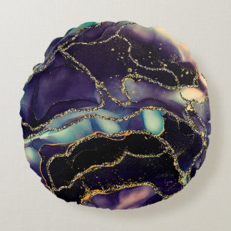 Currents of translucent hues, snaking metallic swi round cushion