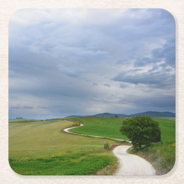 Curvy road towards a destination coaster (Front)