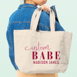 Custom Babe Funny Saying Personalised Name Large Tote Bag<br><div class="desc">Custom Babe Funny Saying Personalised Name Tote Bags features a simple design with the text "custom babe" in modern pink calligraphy script typography and personalised with your name. Perfect for a fun gift for mum, best friends, girlfriend, for birthday, Christmas, holidays, Mother's Day and more. Designed by Evco Studio www.zazzle.com/store/evcostudio...</div>