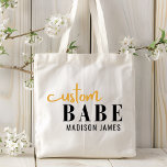 Custom Babe Funny Saying Personalised Name Tote Bag<br><div class="desc">Custom Babe Funny Saying Personalised Name Tote Bags features a simple design with the text "custom babe" in modern black and gold calligraphy script typography and personalised with your name. Perfect for a fun gift for mum, best friends, girlfriend, for birthday, Christmas, holidays, Mother's Day and more. Designed by Evco...</div>