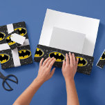 Custom Batman Logo Christmas Snowflake Wrapping Paper<br><div class="desc">Wrap your gifts in Gotham style with the Custom Batman Logo Christmas Snowflake Wrapping Paper, featuring the iconic bat emblem surrounded by festive snowflakes. This high-quality wrapping paper combines superhero flair with holiday cheer, making it perfect for Batman fans of all ages. Personalise it with a custom name or message...</div>