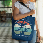 Custom Beach Vacation Tropical Palm Tree Navy Blue Tote Bag<br><div class="desc">Cute summer family beach vacation tote bag with beautiful palm trees in front of a pretty ocean sunset and blue sky. Customise for an island getaway or tropical seaside trip.  Beautiful navy blue personalised bag.</div>