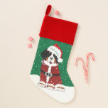 Custom Bernese Mountain Dog Santa Paws Christmas Stocking<br><div class="desc">Cute Personalised Christmas Holiday Bernese Mountain Dog wearing doodle scribble effect Santa suit and Santa hat holding candy cane in its mouth. Cute christmas stocking for berner lovers! Festive snowy background. © EMR Designs</div>