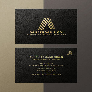 Custom black gold logo building construction business card