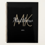 Custom Black Gold Monogram Initial Name Minimalist Planner<br><div class="desc">Personalise and add your name,  monogram initials,  and year. (any year) golden and white letters. The name is written with a hand lettered style script.</div>