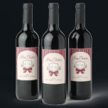 Custom Couple's Monogram Crest Merry Christmas Wine Label<br><div class="desc">Add the perfect finishing touch to your bottled gifts with custom wine labels.  Design features "Merry Christmas" in elegant handwritten script along with a festive crest and holiday bow.  Personalise the tag with your couple's monogram initials and signature line.  All colours are editable.  © Kimbellished,  LLC</div>