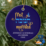 Custom FIRST HANUKKAH MARRIED Hebrew Ceramic Tree Decoration<br><div class="desc">Cute FIRST HANUKKAH MARRIED ceramic ornament with CUSTOMIZABLE NAMES & YEAR. Hanukkah is written in Hebrew. Design shows Hanukkah blue handwriting script typography with blue and yellow dreidel. A beautiful souvenir for couples celebrating their first married Hanukkah. Design is repeated on the back. English version available separately. Also in white....</div>