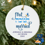 Custom FIRST HANUKKAH MARRIED Hebrew Ceramic Tree Decoration<br><div class="desc">Cute FIRST HANUKKAH MARRIED ceramic ornament with CUSTOMIZABLE NAMES & YEAR. Hanukkah is written in Hebrew. Design shows Hanukkah blue handwriting script typography with blue and yellow dreidel. A beautiful souvenir for couples celebrating their first married Hanukkah. Design is repeated on the back. English version available separately. Also in blue....</div>