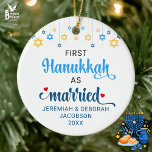 Custom FIRST MARRIED HANUKKAH Ceramic Tree Decoration<br><div class="desc">Cute FIRST HANUKKAH MARRIED ceramic ornament with CUSTOMIZABLE NAMES & YEAR. Design shows Hanukkah blue handwriting script typography with blue and yellow hanging stars. Two red stars decorate the word 'married'. A beautiful souvenir for couples celebrating their first married Hanukkah. Design is repeated on the back. Hebrew version available separately....</div>
