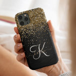 Custom Gold Glitter Black Sparkle Monogram iPhone 14 Pro Case<br><div class="desc">Easily personalize this trendy elegant phone case design featuring pretty gold sparkling glitter on a black brushed metallic background.</div>