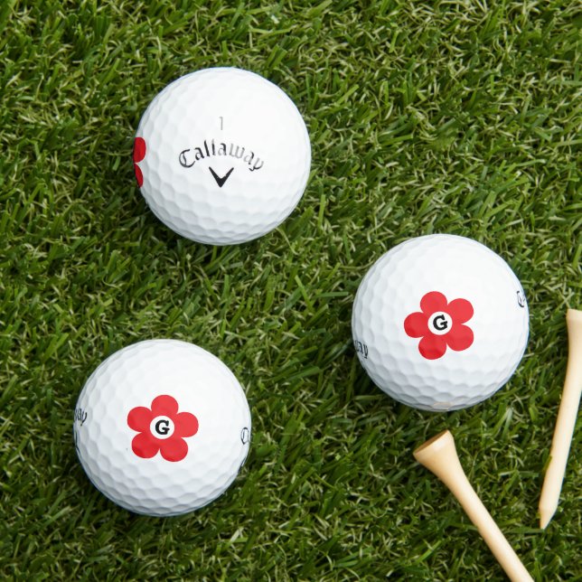 Custom golf balls with red flower monogram logo (Insitu Grass)