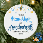 Custom GRANDPARENTS FIRST HANUKKAH  Ceramic Tree Decoration<br><div class="desc">Cute FIRST HANUKKAH as GRANDPARENTS ceramic ornament with CUSTOMIZABLE NAMES & YEAR. Design shows Hanukkah blue handwriting script typography with blue and yellow hanging stars. A beautiful souvenir for grandparents first Hanukkah. Design is repeated on the back. Saba Ve-Savta version available separately.</div>