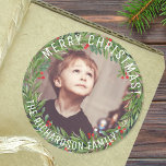 Custom Holly Wreath Family Photo Christmas Classic Round Sticker<br><div class="desc">Add a touch of festive charm to your presents with this round sticker featuring a classic Christmas wreath.  Customise it with your family photo,  name,  and a warm "Merry Christmas" greeting to add a personalised touch to your holiday gifts.</div>