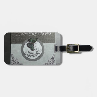 Custom item with teal butterfly on shades of grey luggage tag