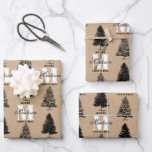 Custom Merry Christmas Kraft Vintage Monogram   Wrapping Paper Sheet<br><div class="desc">A personalised "Merry Christmas" monogram design with Xmas trees on a kraft brown paper look background. An ideal festive custom design for the holiday season. Customise the vintage Christmas tree monogram and make it your own!</div>